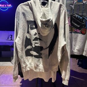 Taylor Swift Midnights album hoodie with a graphic print